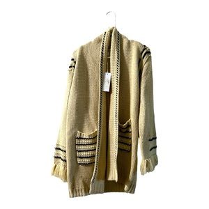 A cream and black SAGE crochet jacket.